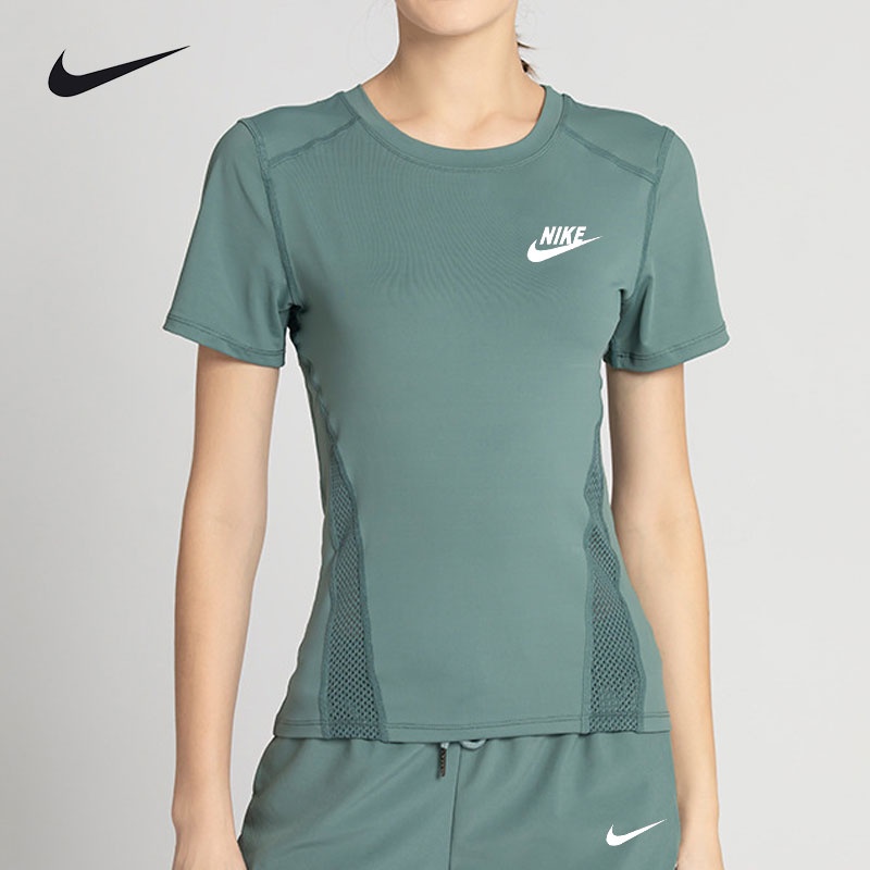 Bộ Đồ Thể Thao Nike Áo Thun Dáng Rộng Phối Quần Short Nhanh Khô Cá Tính Cho Nữ