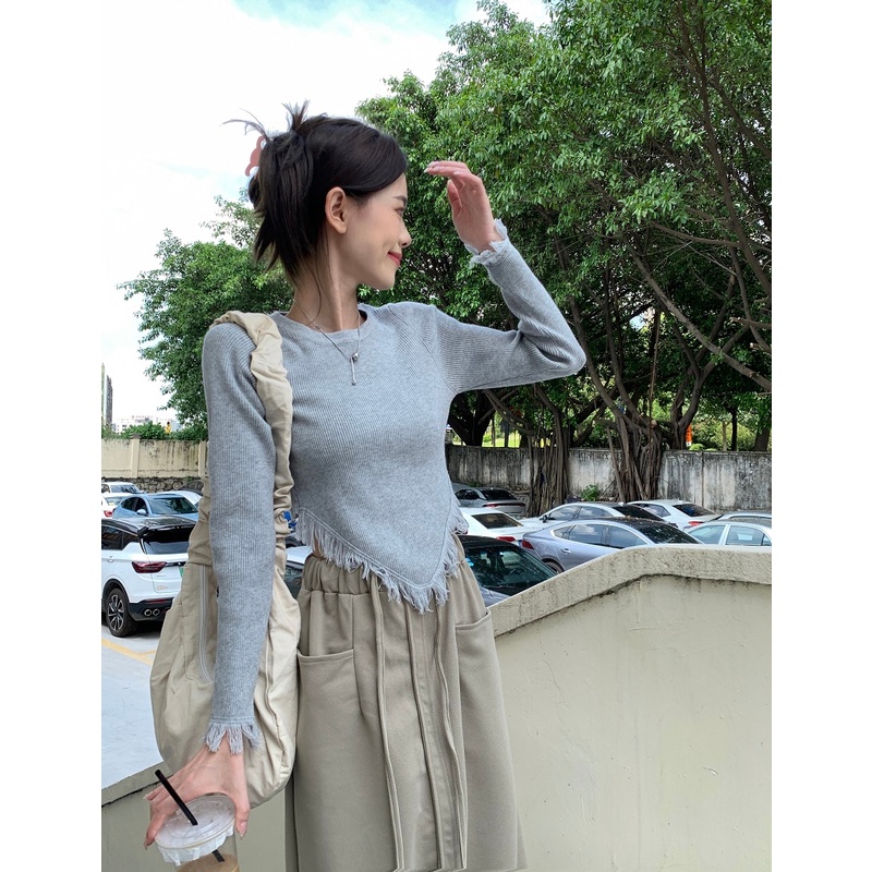 Áo ZHELIHANGFEI dệt kim tay dài dáng ngắn phối tua rua thiết kế lệch tà cá tính cho nữ