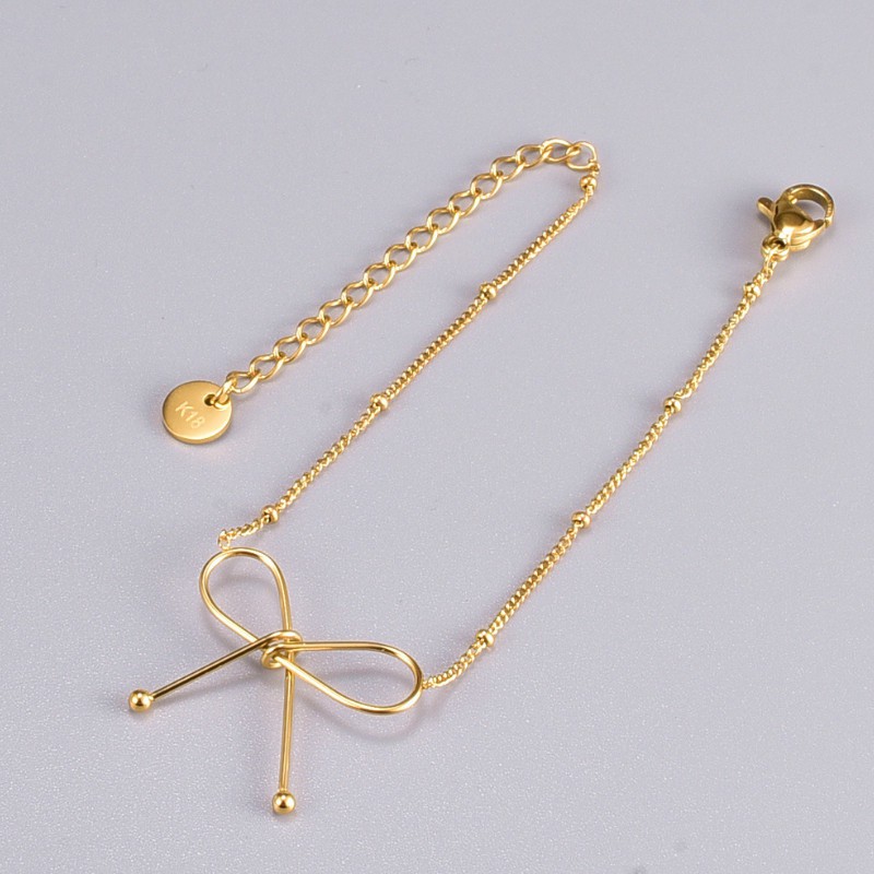 Lắc Tay Nữ Nơ Xinh Titan Ko Đen TT 3737