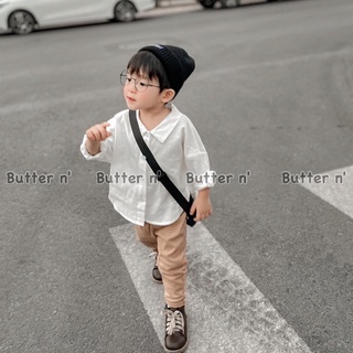Sơ mi trắng vạt xẻ cho bé
