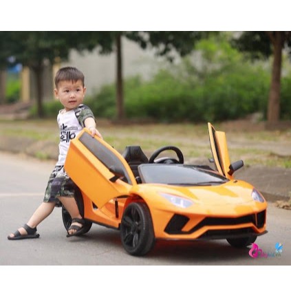 Xe ô tô điện trẻ em kiểu dáng siêu xe Lamborghini LT 998  2 chỗ ngồi Ắc qui 12V/7Ah Bảo hành 06 tháng