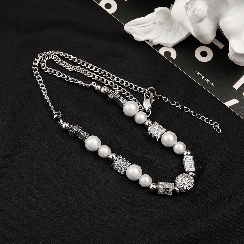 Dây chuyền titan mặt đầu lâu đính đá phối hạt ngọc không gỉ MN02