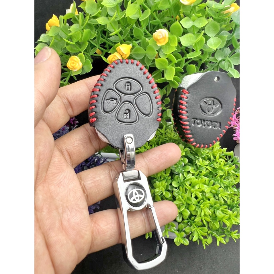 Bao Da chìa khóa 4 nút có chìa xe Toyota Innova , Vios , Camry , Hilux , Fortuner , Yaris , Corolla Altis