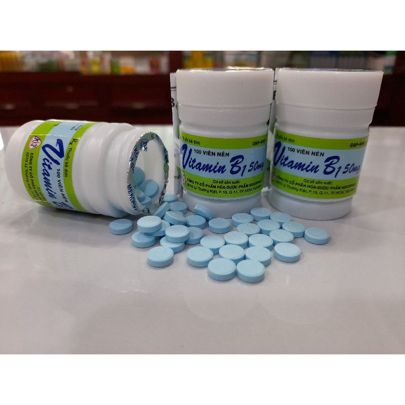 Vitamin B1.Lọ 100 viên màu xanh.Hộp 10 vỉ ×10 viên