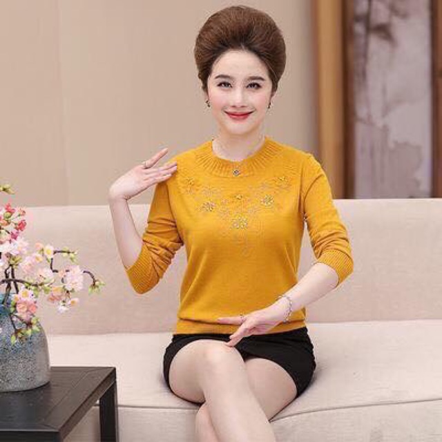 Áo len xả lỗ