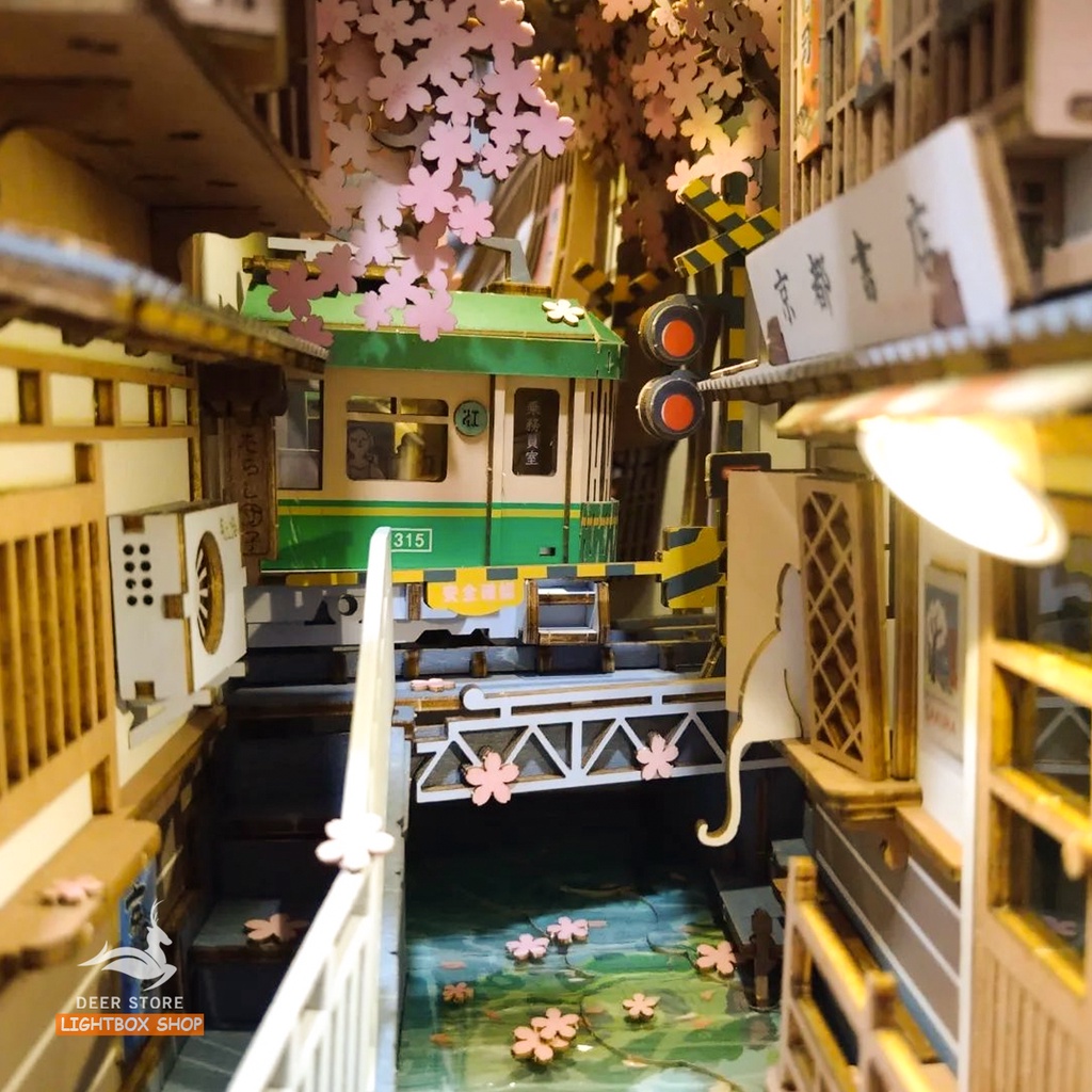 Mô hình Book Nook tự lắp ráp bằng gỗ Rolife Sakura Densya. Đèn có công tắc cảm ứng. TGB01