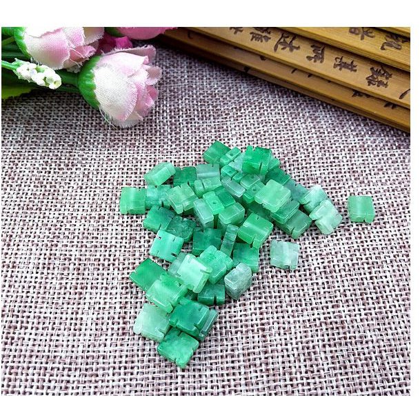 gói 1 viên charm chữ Vạn đá 4x8mm tự nhiên, lỗ xỏ 1mm làm vòng P131-23-MH 2634