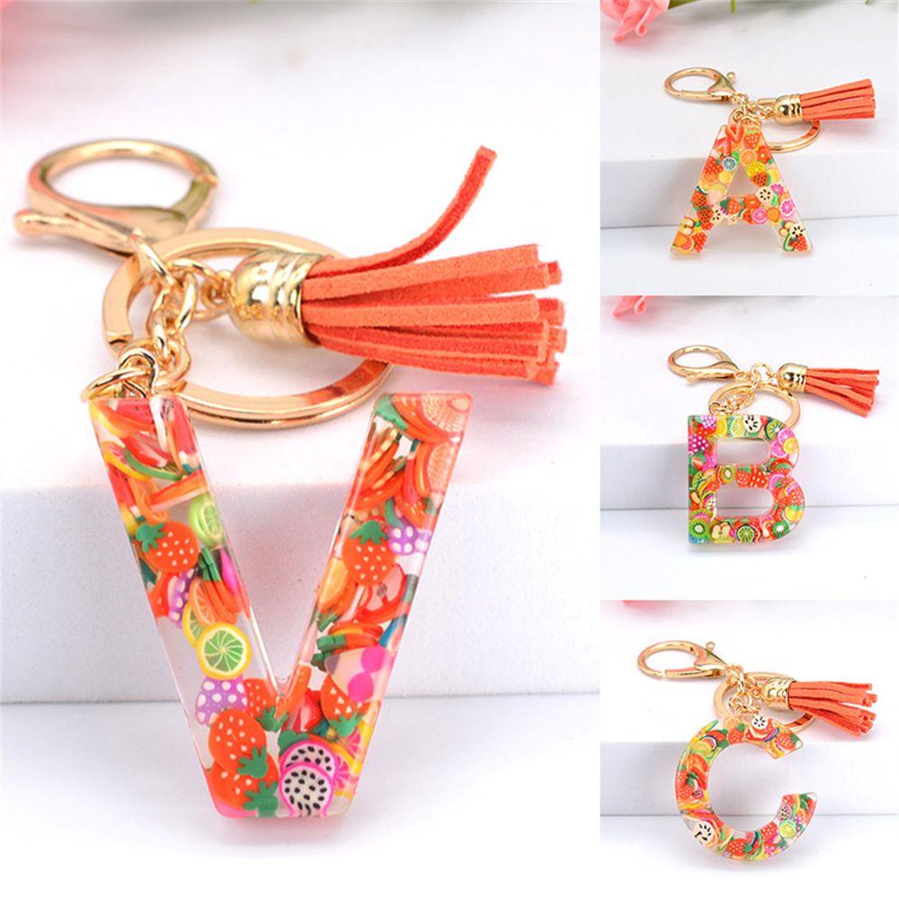 Móc Khóa Hình 26 Chữ Cái Gắn Lát Trái Cây Màu Sáng Phối Tua Rua Thời Trang Cho Nữ