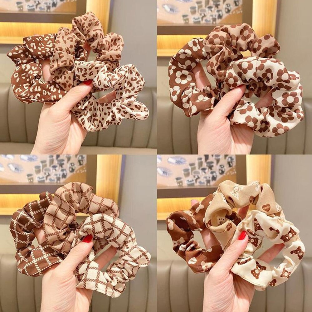 Dây Cột Tóc Scrunchies Bằng Vải Họa Tiết Da Báo Thời Trang Mùa Đông Cho Nữ