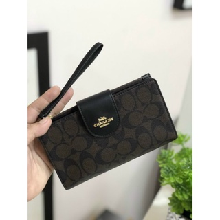 Ví C0ach Wallet đựng điện thoại chất liệu da bò cực xịn