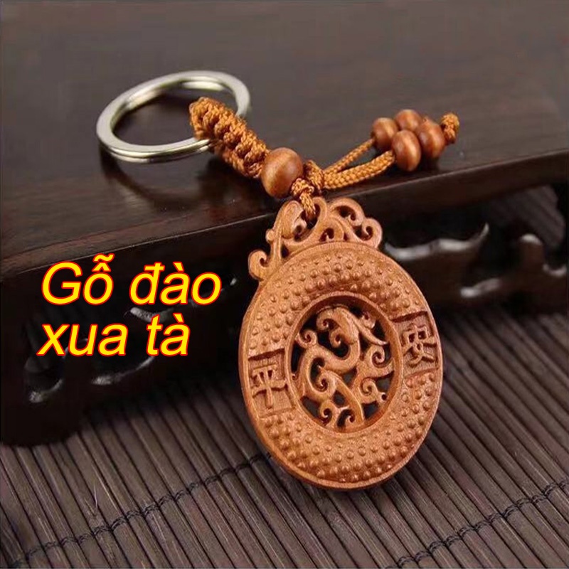 Móc khóa gỗ đào vật phong thủy bình an xua tà bình an