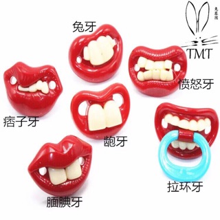 Núm ngậm ti giả hình răng hài hước cho bé
