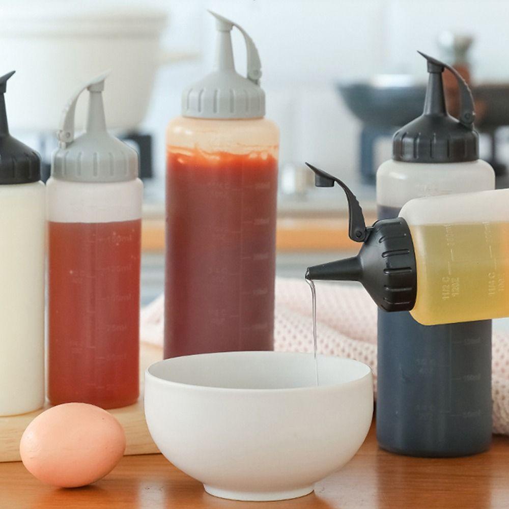 Set 2 Chai Nhựa Đựng Nước Sốt Có Nắp Đậy Tiện Dụng