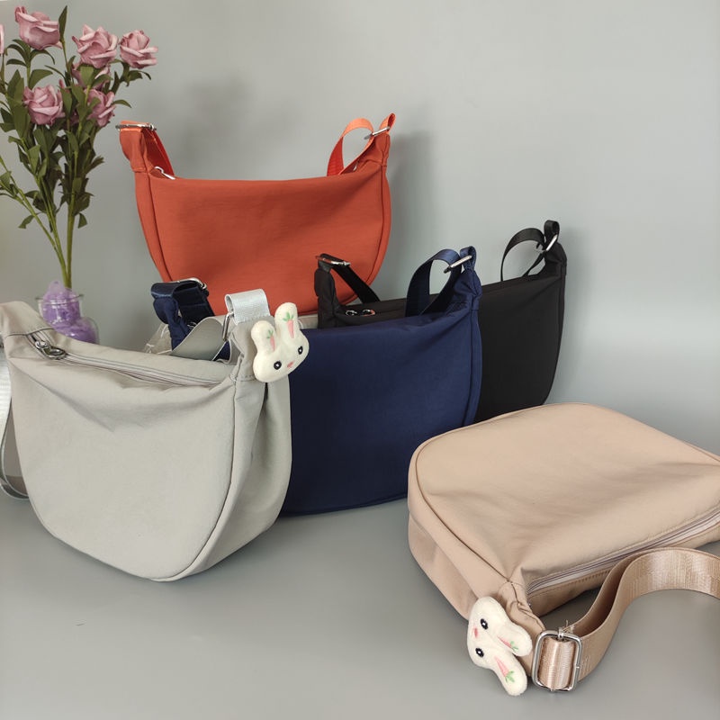 Túi Xách Đeo Vai Bằng Vải Bạt Nylon Chống Nước Màu Trơn Cho Nữ