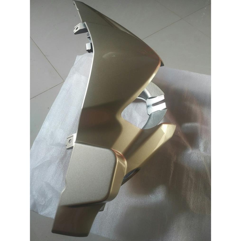 Ốp đầu trước (Nắp trước tay lái) Taurus vàng xám