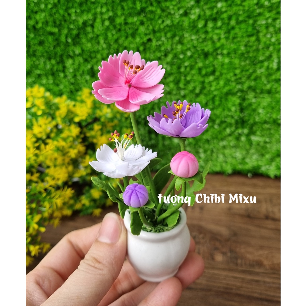 Bộ tượng Tứ Không mẫu đeo chuỗi kèm chậu hoa đất sét và chân đế Tài Lộc Phát