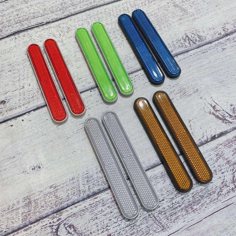 Cặp mắt mèo phản quang dán phuộc trước nhiều màu gắn các loại xe máy