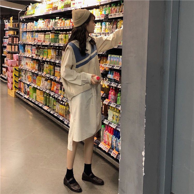 Áo khoác gi-lê dệt kim cổ chữ V dáng rộng kẻ sọc thời trang cho nữ