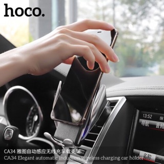 Sạc ko dây điện thoại trên xe hơi hoco ca34