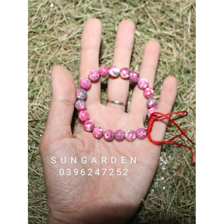 Vòng tay gỗ hóa thạch màu hoa đào 8ly