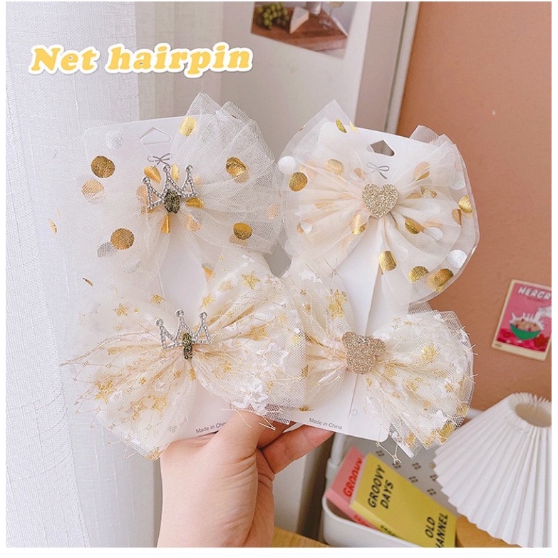 Kẹp tóc nơ tone vàng xinh xắn cho bé