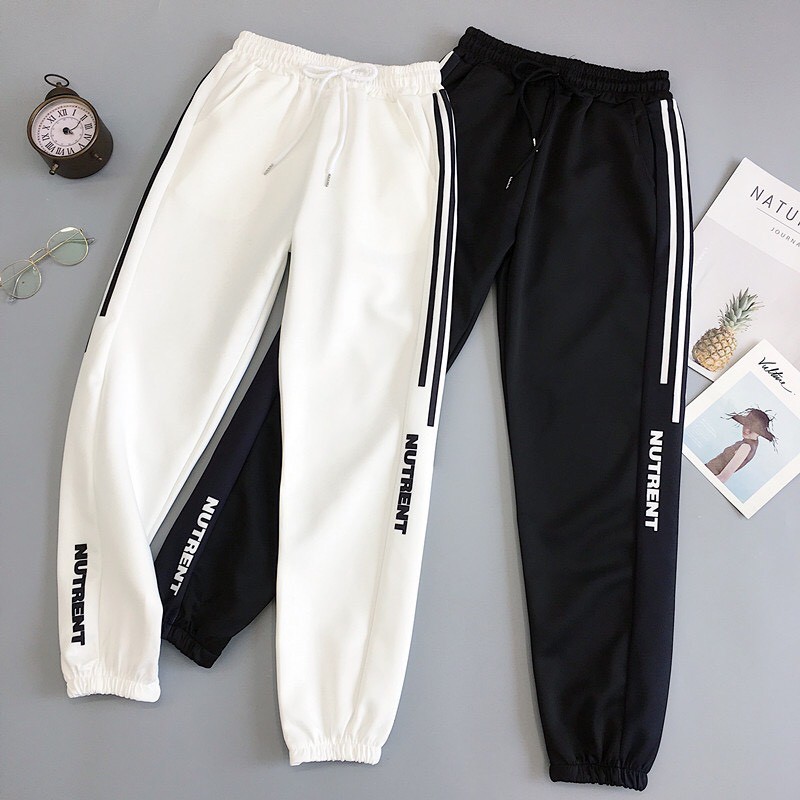 QUẦN JOGGER NAM NỮ BÓ ỐNG PHỐI SỌC CHỮ NUTREND PHONG CÁCH THỂ THAO, CHẤT THUN THỜI TRANG BTSD569