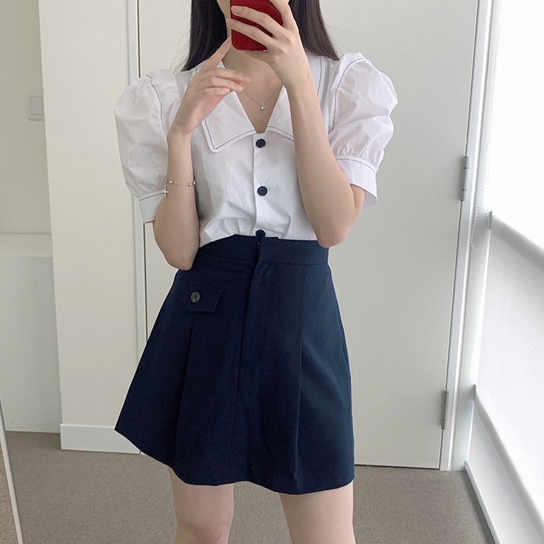 Set 35685 có thể tách rời gồm áo sơ mi và chân váy lưng cao phối túi phong cách Hàn Quốc