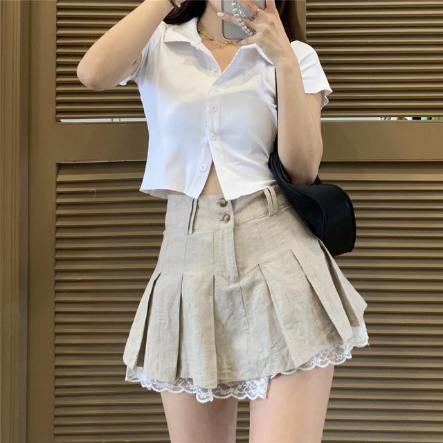 Ready Stock Korean hot girl polo collar cardigan short-sleeved T-shirt + two-piece design cotton and linen lace stitching pleated skirt