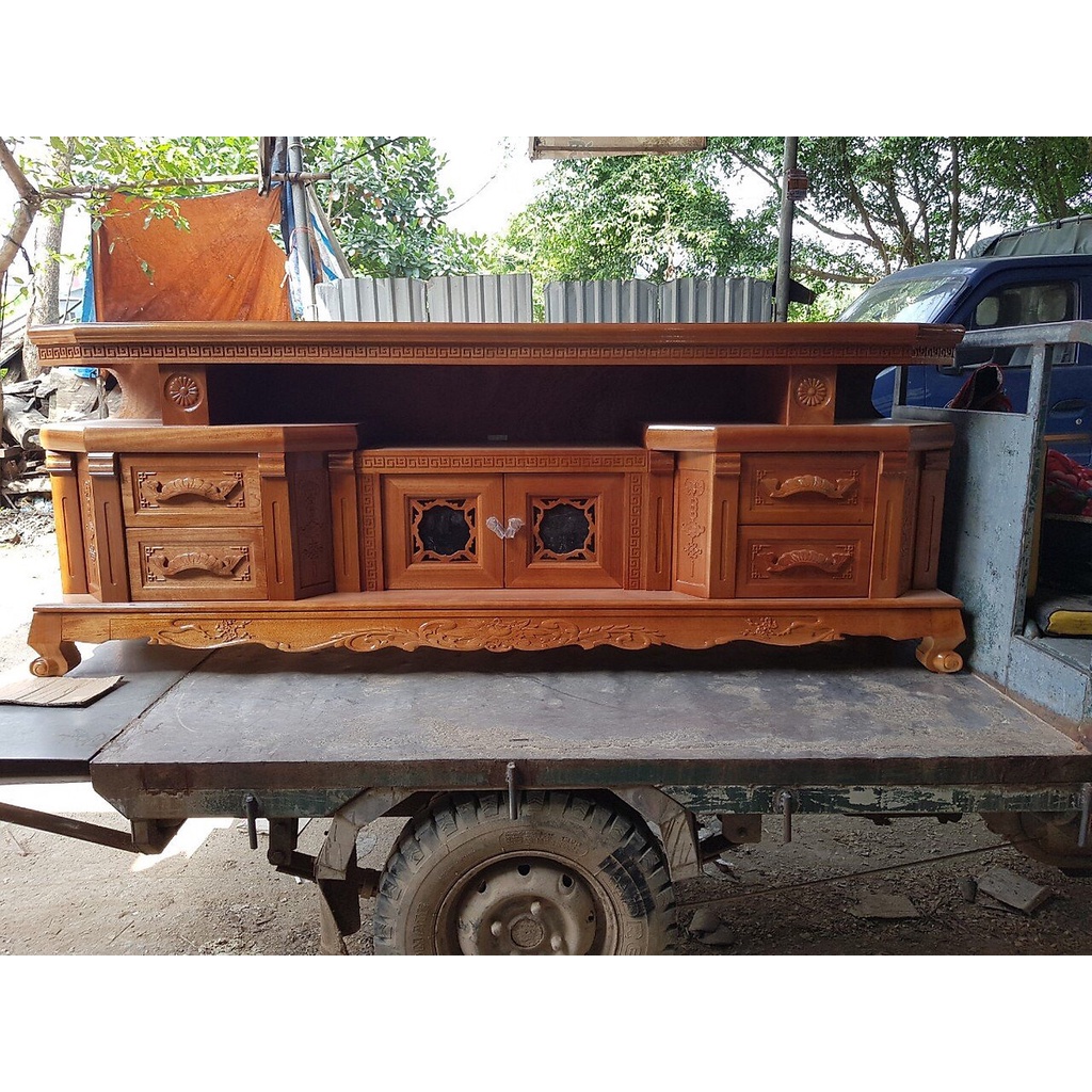 Kệ tivi vát cạnh gỗ xoan đào  màu cánh gián vân gỗ tự nhiên gỗ đã được xử lý tẩm sấy chống mối mọt đủ kích thước