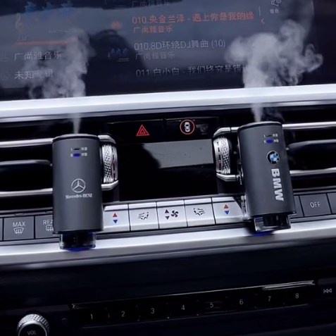 Máy khuếch tán tinh dầu nước hoa cài khe gió điều hòa xe hơi