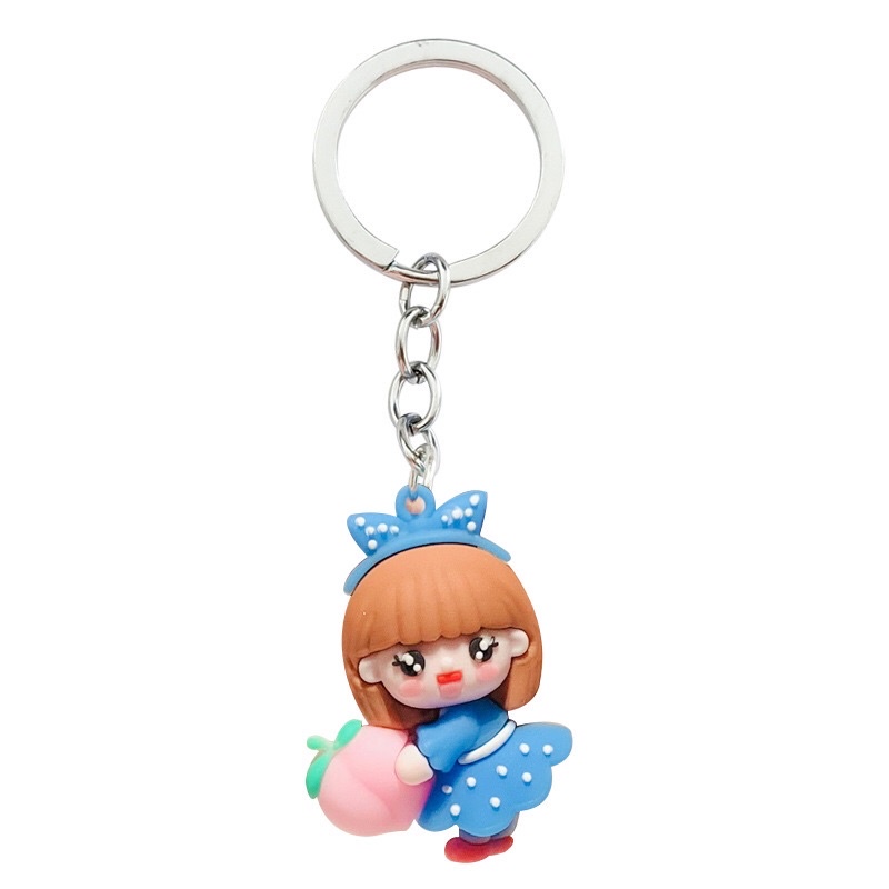 Móc khóa búp bê ôm trái táo dễ thương