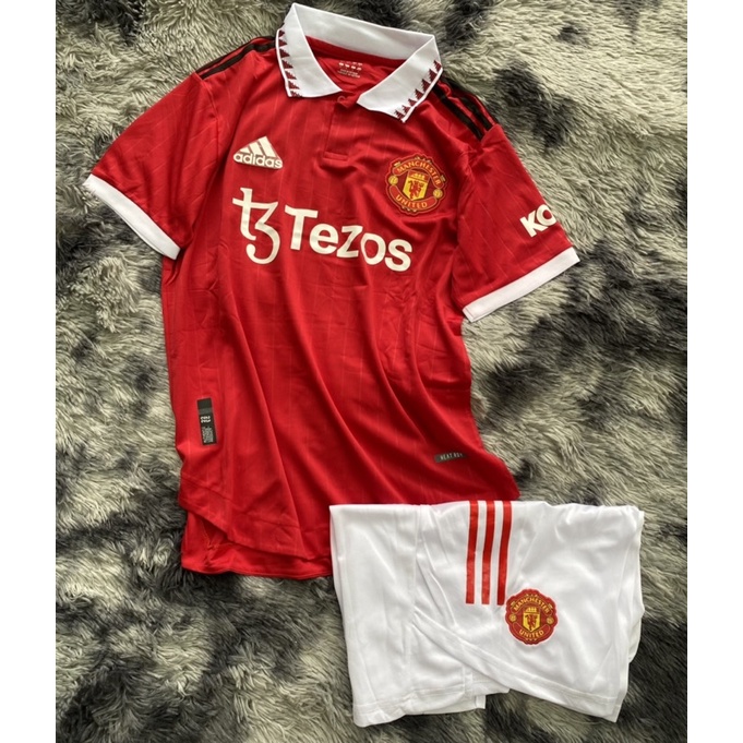 Set bộ quần áo thể thao bóng đá nam nữ clb mu manchester united teroz áo đỏ quần trắng xẻ tà 202: