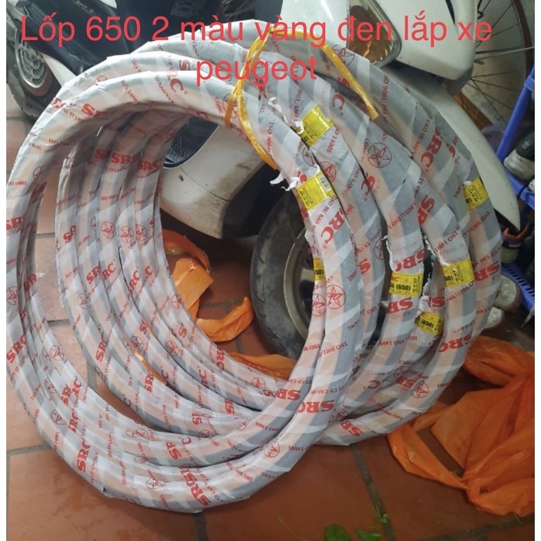 Lốp 650 2 màu đen +vàng nắp xe peugeot