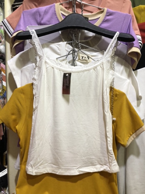 Áo lồng mặc bên trong vest hoặc sơ mi