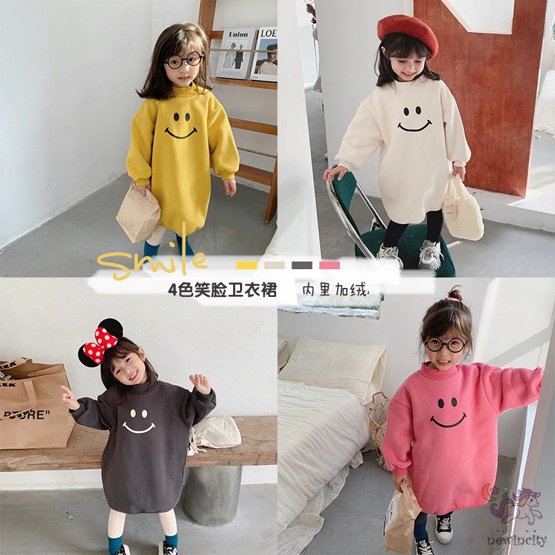 Đầm Thun Dài Tay In Họa Tiết Mặt Cười Cho Bé