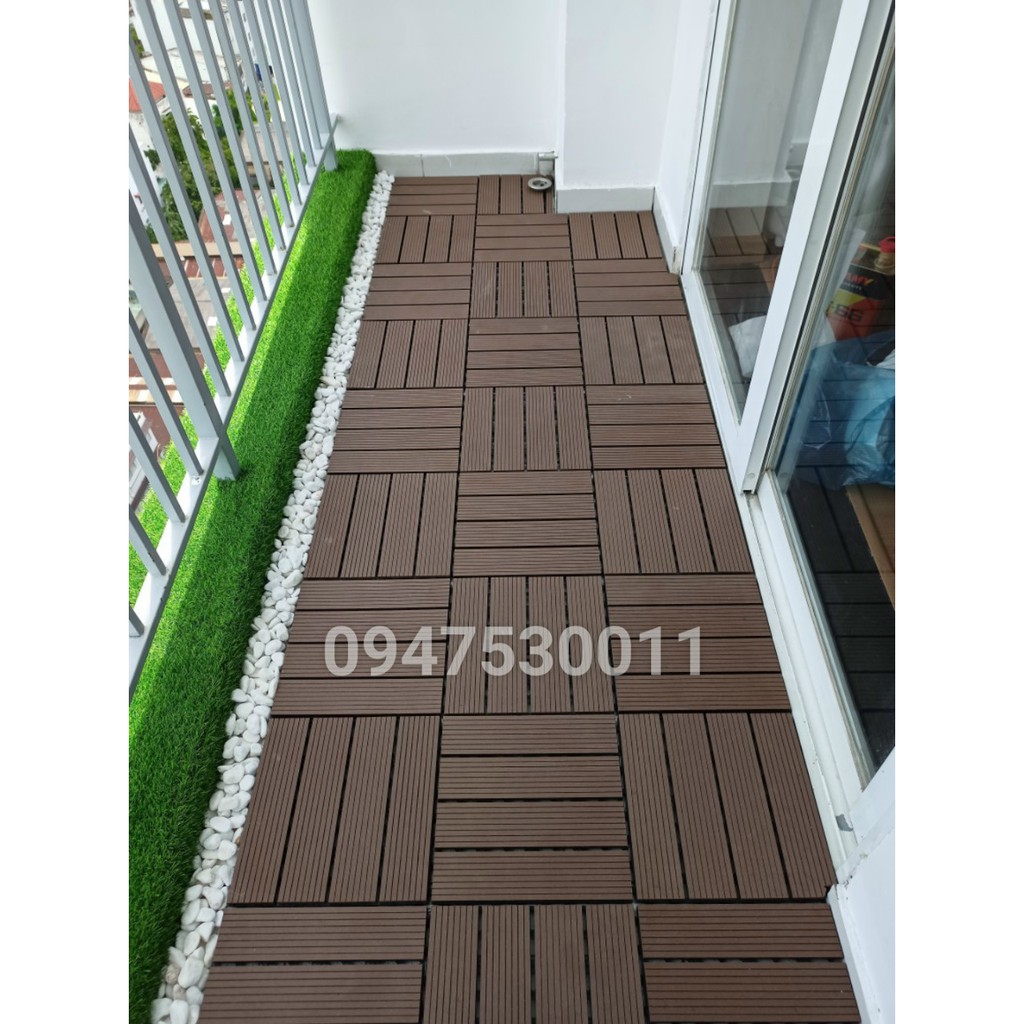 Vỉ Sàn Gỗ Nhựa Composite Lót Sàn Ban  Sân Vườn. Vỉ Gỗ Tràm Tự Nhiên. kích thước 30cm*30cm.Nhận thi công
