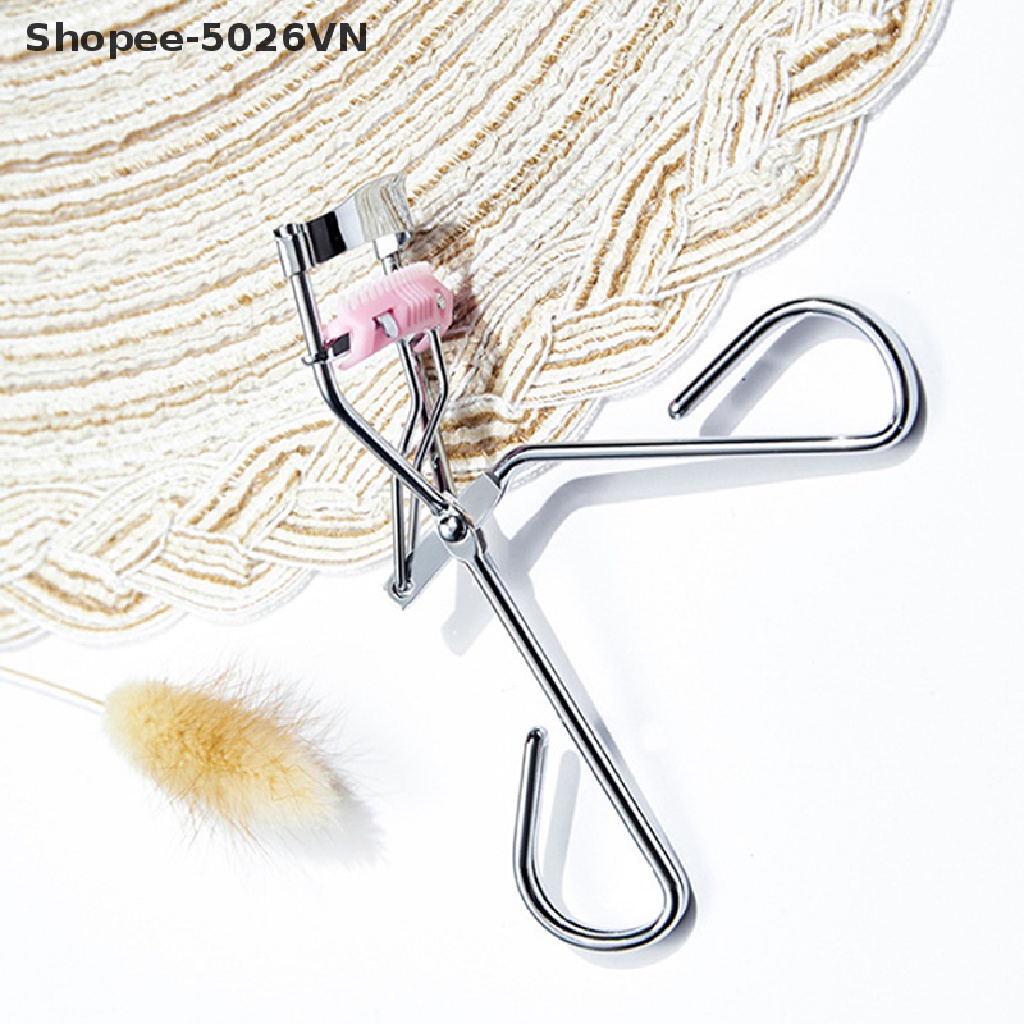 1 Dụng Cụ Bấm Cong Mi Tích Hợp Lược Chải Tiện Dụng