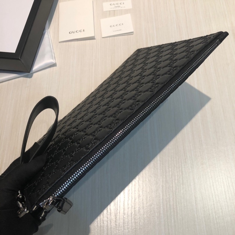 Cluth cầm tay cho nam Gucci GC da thật cao cấp bản dẹt dập chìm logo thương hiệu