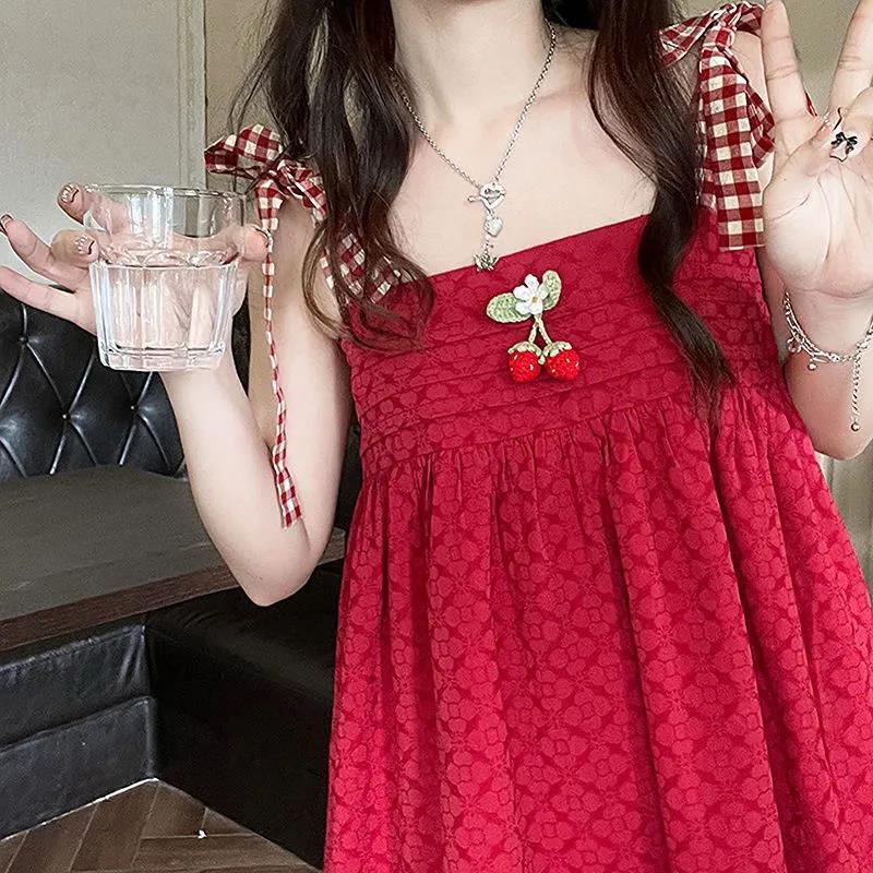 Set Đầm Hai Dây + Áo Choàng Chống Nắng Tay Phồng Đính Nơ Hoạ Tiết Dâu Tây Dễ Thương Xinh Xắn Cho