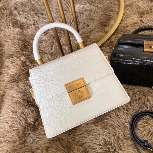 Túi cnk mặt vàng