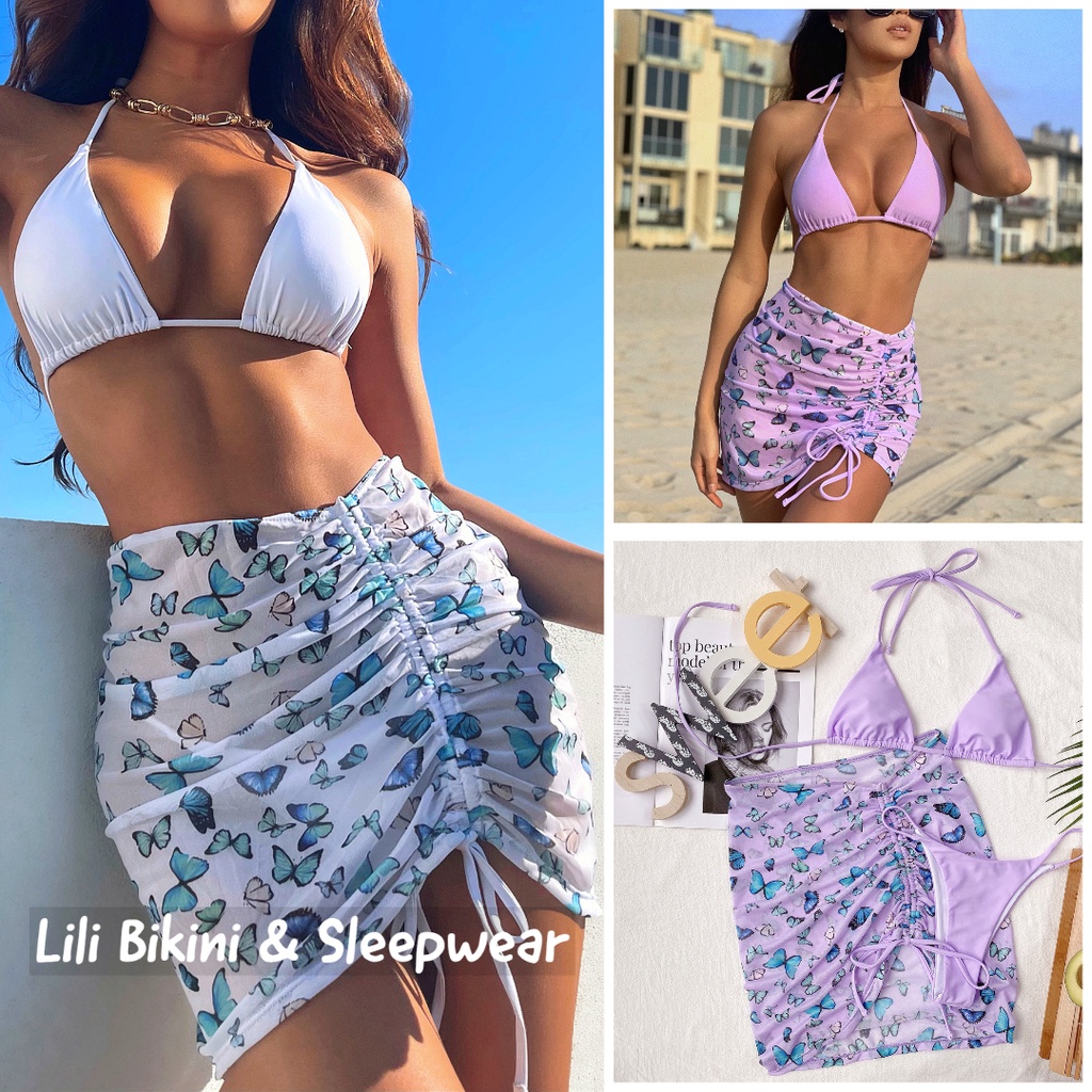 Bộ bikini 2 mảnh sexy Âu Mỹ kèm váy kín đáo hoạ tiết bướm màu trắng, tím
