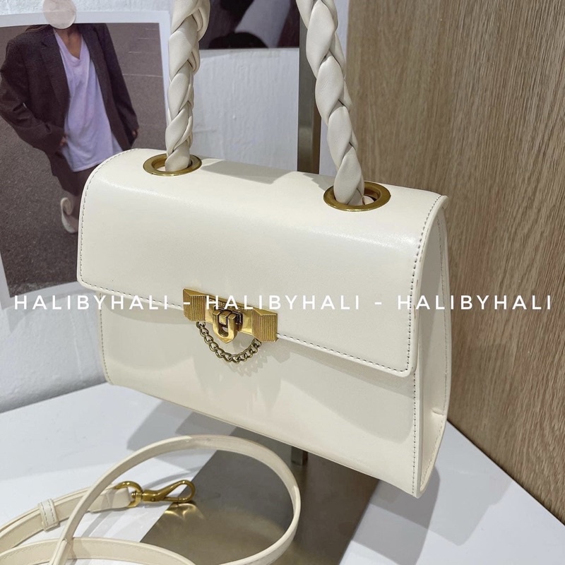 Túi cnk khoá nơ xích đeo chéo siêu xinh