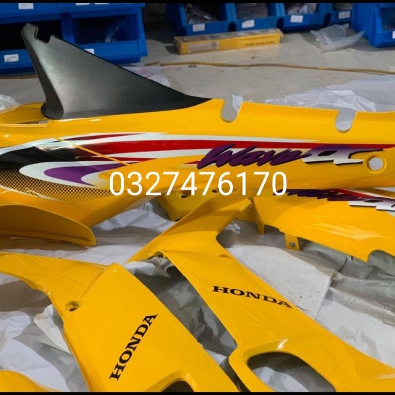 Bộ nhựa dàn áo xe WAVE Alpha đời đầu màu vàng zin honda