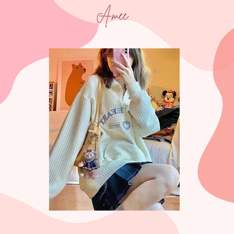 Áo sweater cổ polo phối túi thêu chữ tay dài form rộng