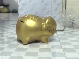 Heo đất vàng đựng tiền
