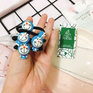 CỘT TÓC, KẸP TÓC DORAEMON ẢNH THẬT