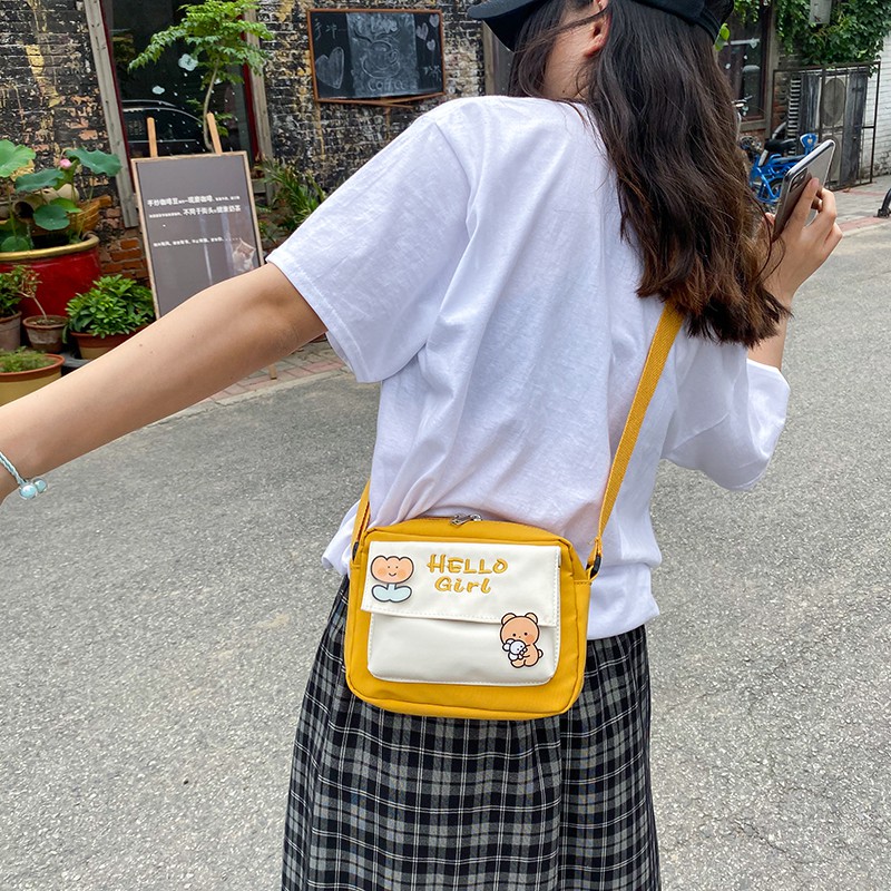 Túi Đeo Chéo Mini Nữ Hello Girl Vải Chống Thấm Nước Tốt Nhỏ Gọn Và Siêu Đáng Yêu Gắn Sticker Xinh Xắn Thời Trang