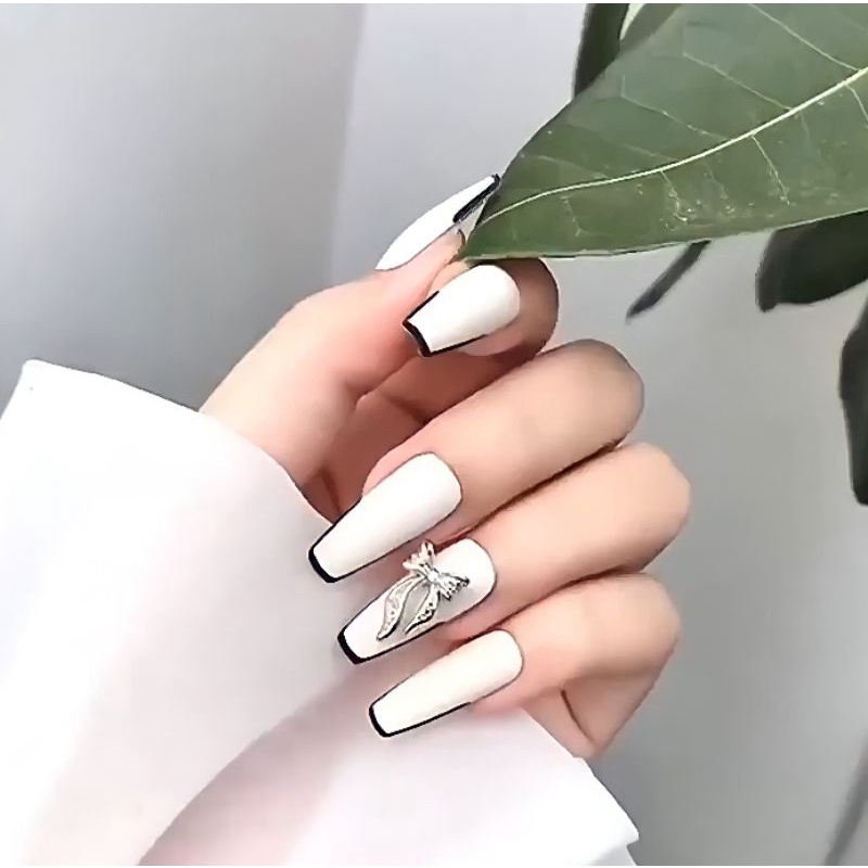 Nailbox thiết kế trắng viền đen gắn nơ đá