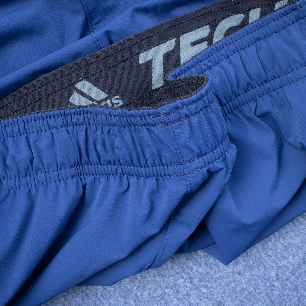 Quần short đùi thể thao nam chất gió co giãn 4 chiều không thấm nước Das 3 sọc bên sườn | BigBuy360 - bigbuy360.vn