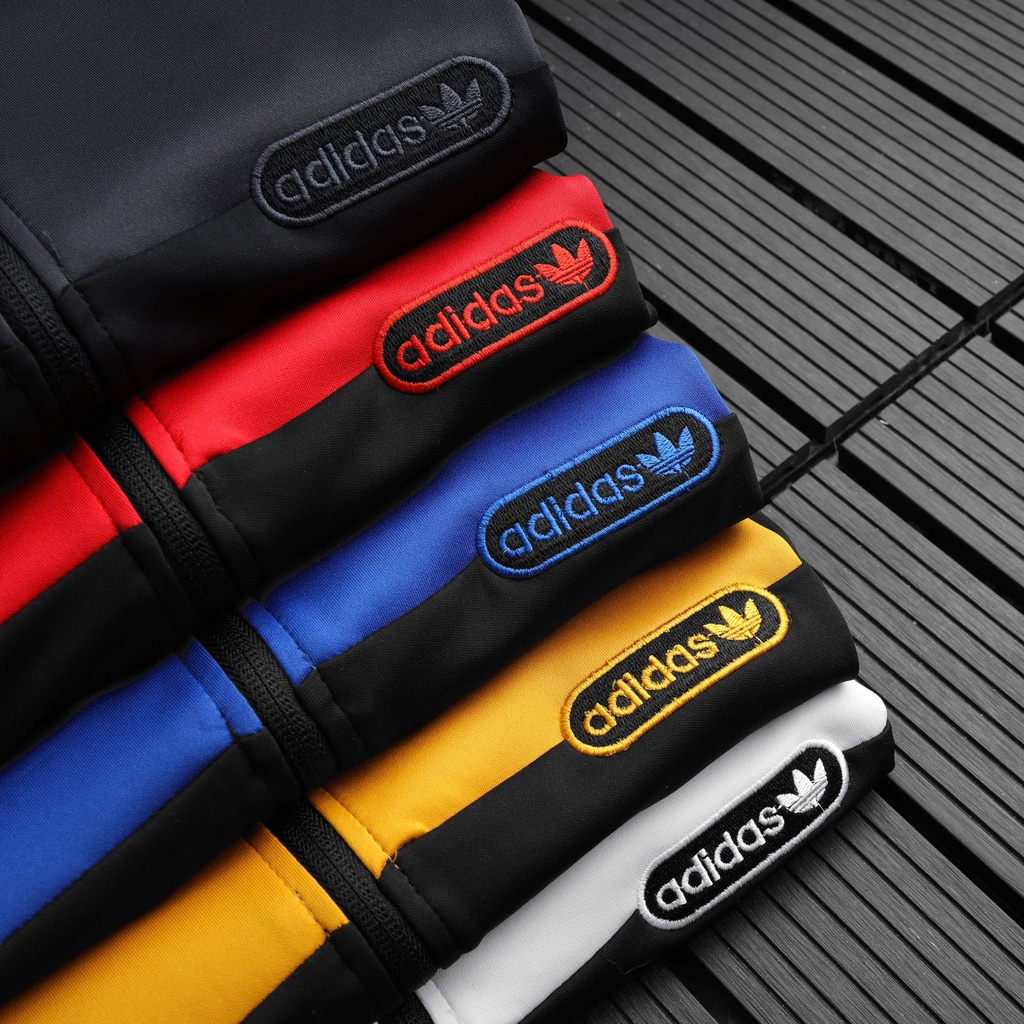 Áo khoác thể thao phối sọc chất liệu poli 2 da cao cấp 8623